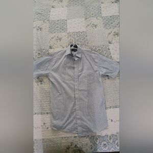 white shirt with blue dots